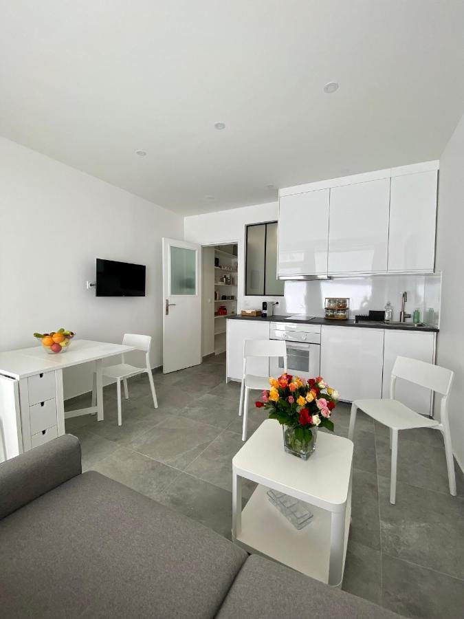 Chez Les Artistes De Menilmontant Apartamento Paris Exterior foto