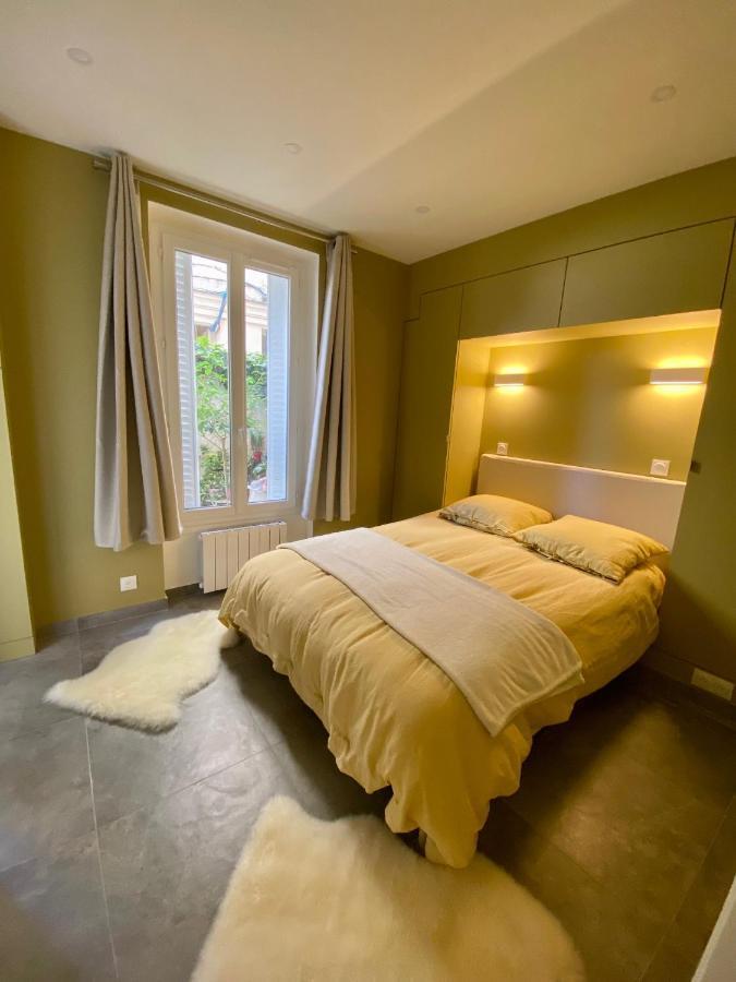 Chez Les Artistes De Menilmontant Apartamento Paris Exterior foto